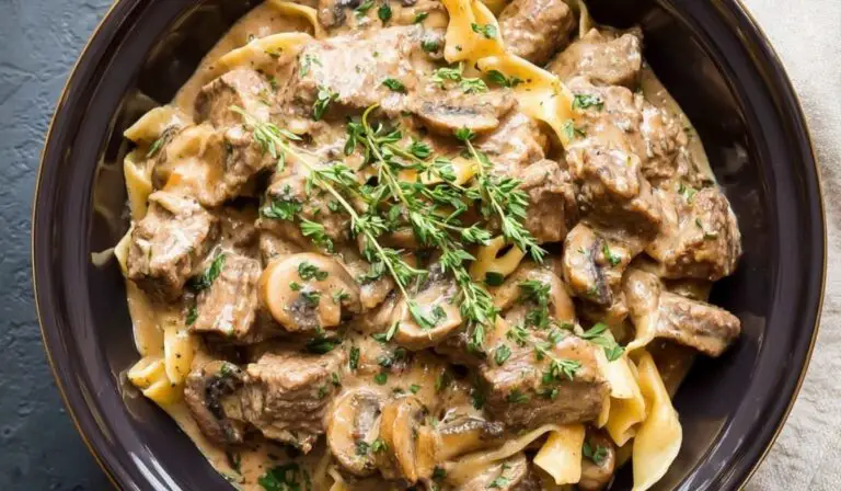Slow Cooker Beef Stroganoff served on a rustic wooden table