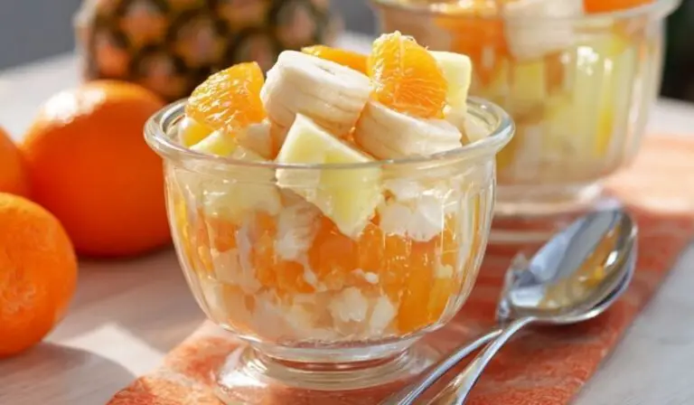Sunshine Salad with fruits and vegetables in a glass bowl
