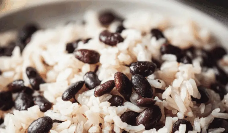 Rice and Black Beans served in a bowl with cilantro and lime
