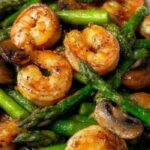 Shrimp and Asparagus Stir-Fry with Mushrooms in bowl