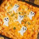 Halloween Buffalo Chicken Dip served in pumpkin bowl