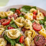 tortellini pasta salad in rustic bowl