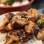 Crock Pot Teriyaki Chicken served on rice with sesame seeds