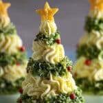 Deviled Egg Christmas Trees arranged on a festive serving platter