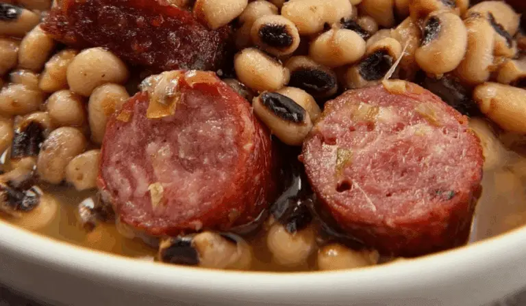 smoked sausage and black-eyed peas in a rustic bowl