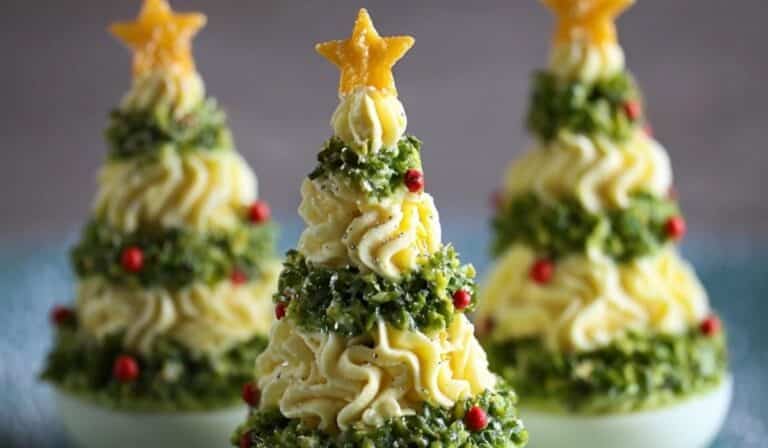 Deviled Egg Christmas Trees arranged on a festive serving platter