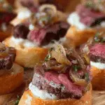 steak crostini with horseradish sauce and caramelized onions