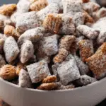 Peanut Butter Puppy Chow in rustic bowl