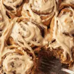 Gingerbread Cinnamon Rolls fresh from oven with glaze