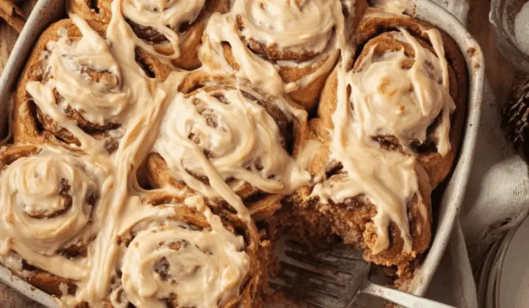 Gingerbread Cinnamon Rolls fresh from oven with glaze