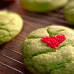 Grinch cookies on festive tray