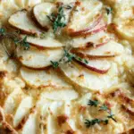 Apple and White Cheddar Tart with Honey on rustic table