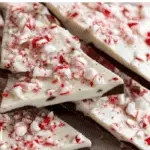 Peppermint Bark on parchment with crushed candies