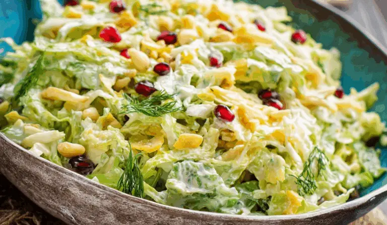 Savoy Cabbage Salad in rustic bowl with toppings