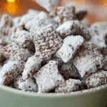 Puppy Chow Recipe aka Muddy Buddies in festive bowl