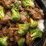 Slow Cooker Beef and Broccoli served with rice