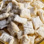 Zesty Lemonade Puppy Chow Snack in a glass bowl