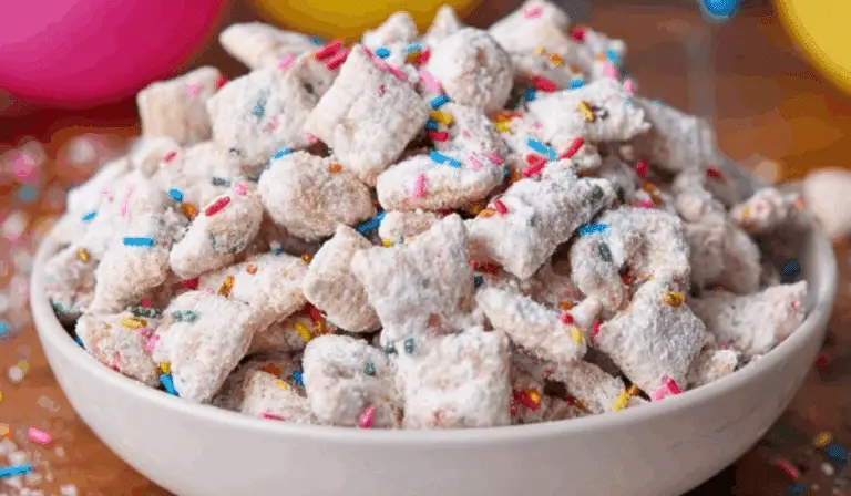 Birthday Cake Puppy Chow in a festive bowl