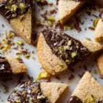 Salted Chocolate Pistachio Shortbread on ceramic plate