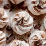 Chocolate Swirled Meringue Cookies styled on rustic table