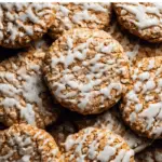 Iced Oatmeal Cookies with classic glaze on rustic table