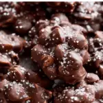 Sea Salt Dark Chocolate Almond Clusters on rustic table