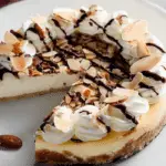 Amaretto Cheesecake slice with almonds and chocolate